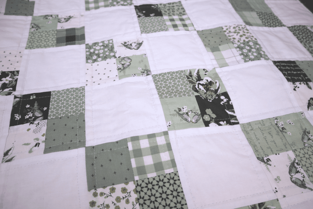 Simple Charm Pack Baby Quilt Pattern - Free Four Square Quilt Pattern